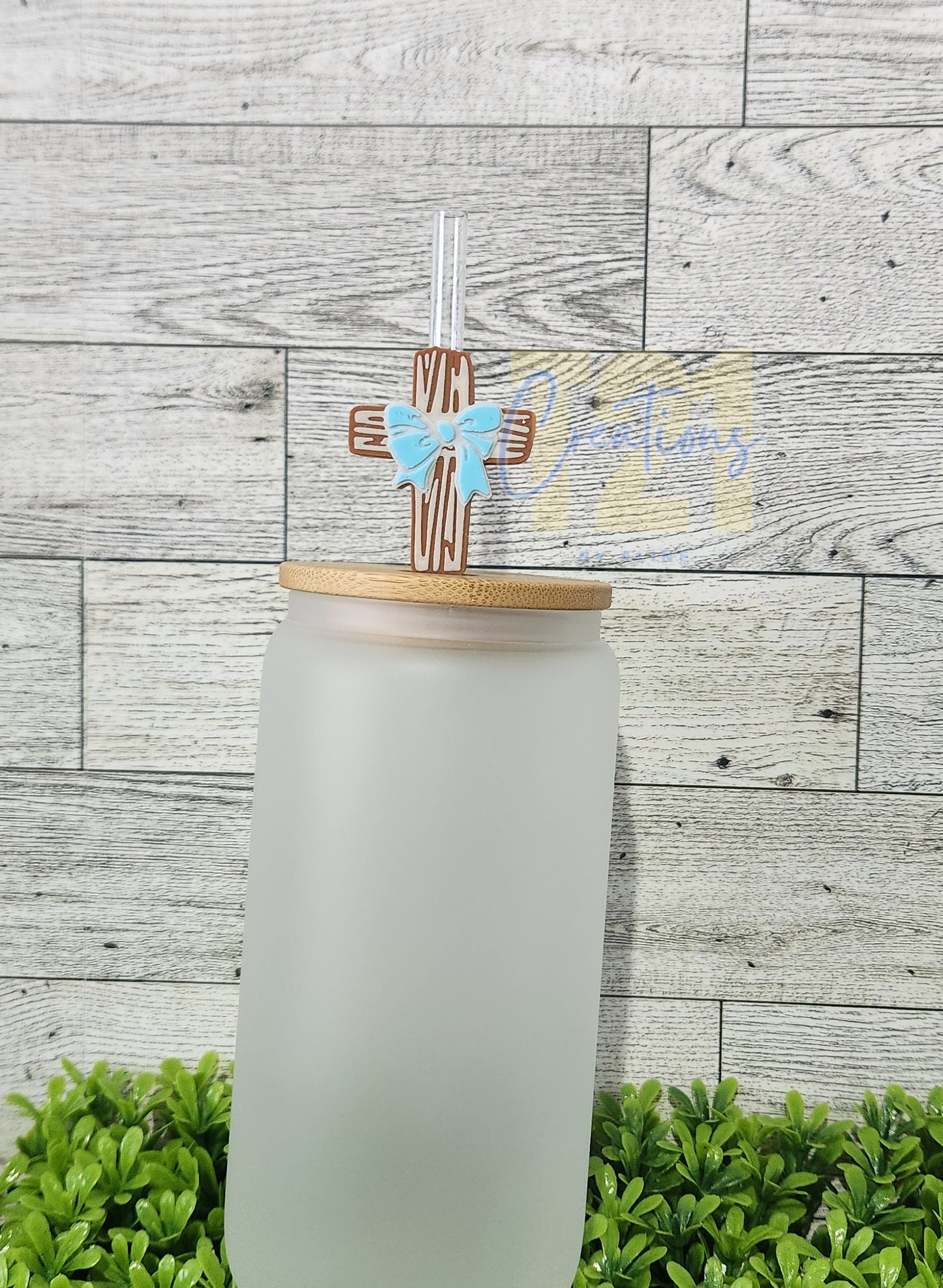 CROSS WITH BOW STRAW TOPPER