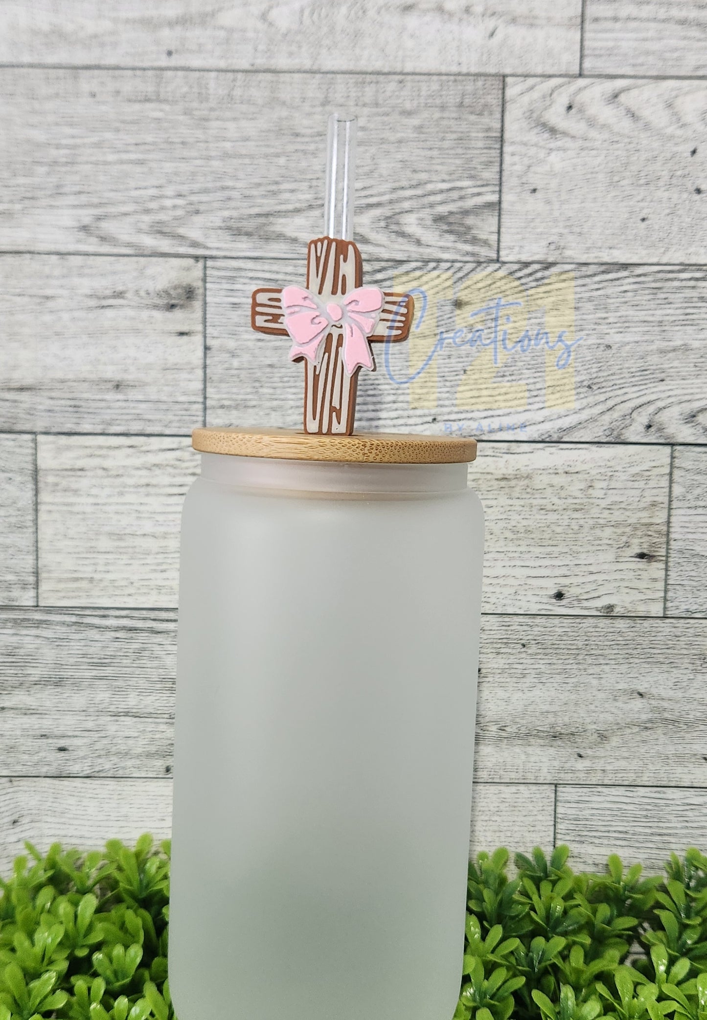 CROSS WITH BOW STRAW TOPPER