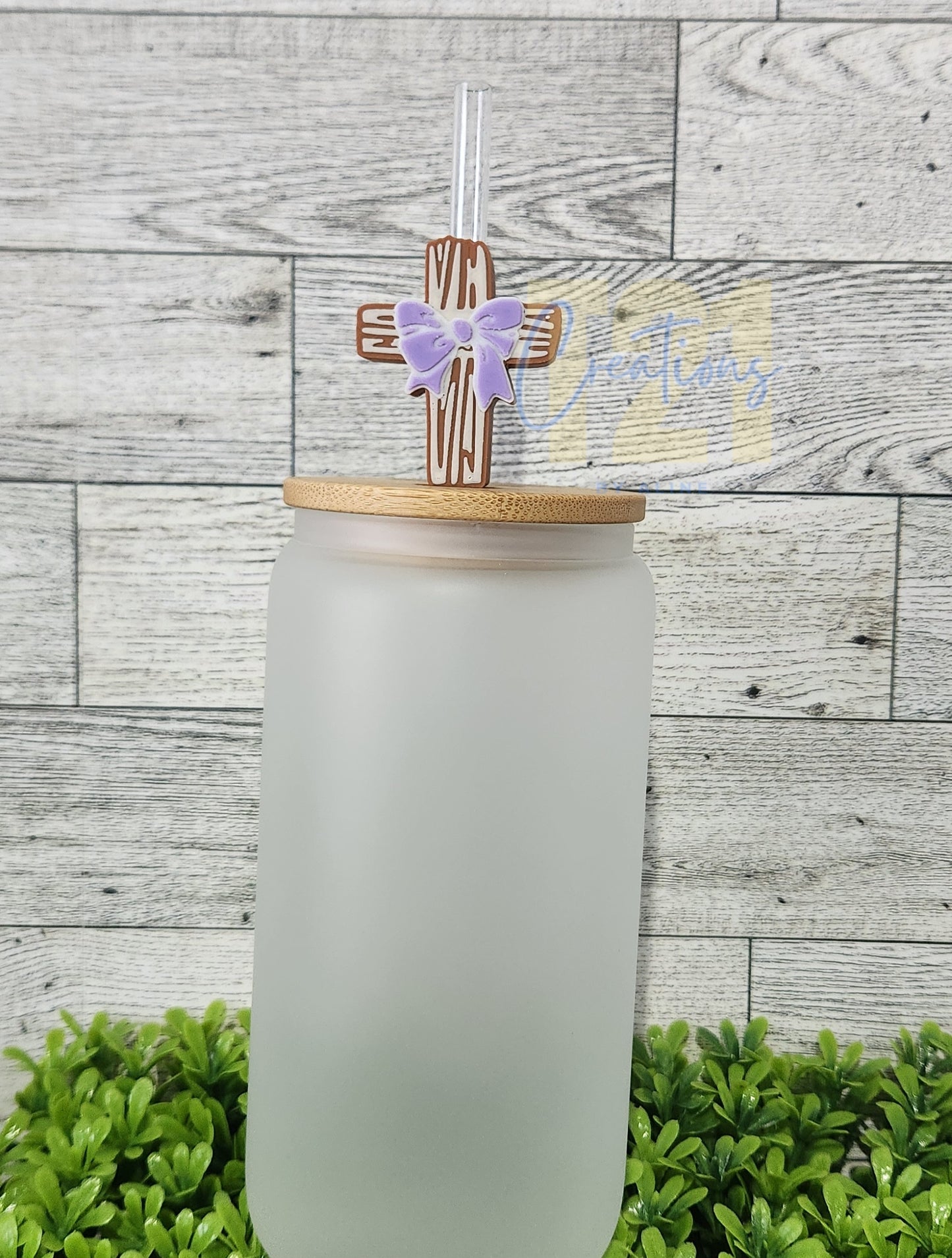 CROSS WITH BOW STRAW TOPPER